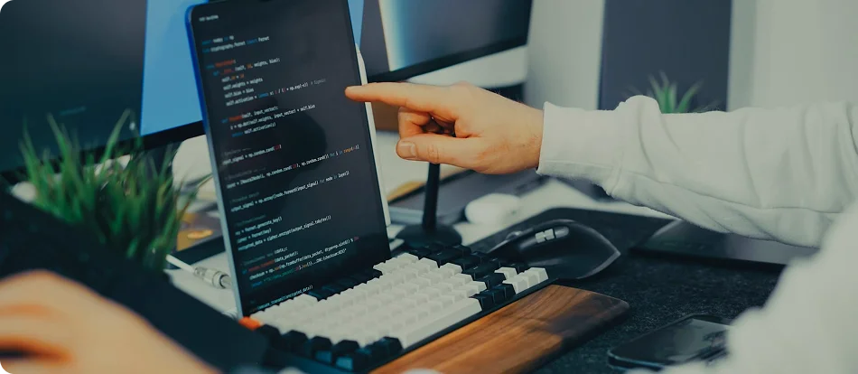 Custom software development coding on a computer
